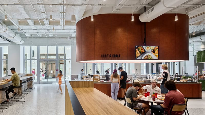 Millwork at Fordham University Marketplace with Pure + FreeForm's Prismatic Spritz rust finish, enhancing the space with rich texture and modern elegance.