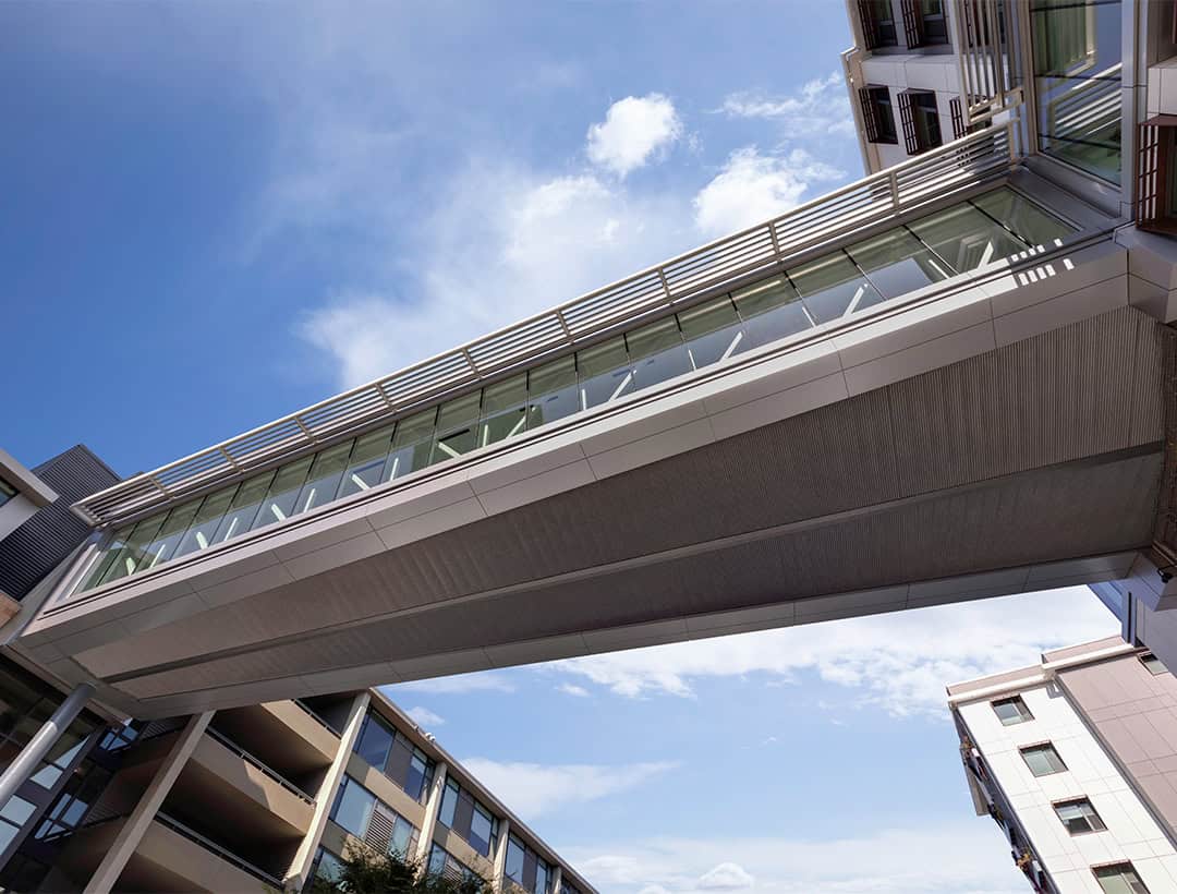 Skyway at Terwilliger Plaza featuring architectural metal in a sleek Piombo finish, enhancing the modern, elegant design of the space.