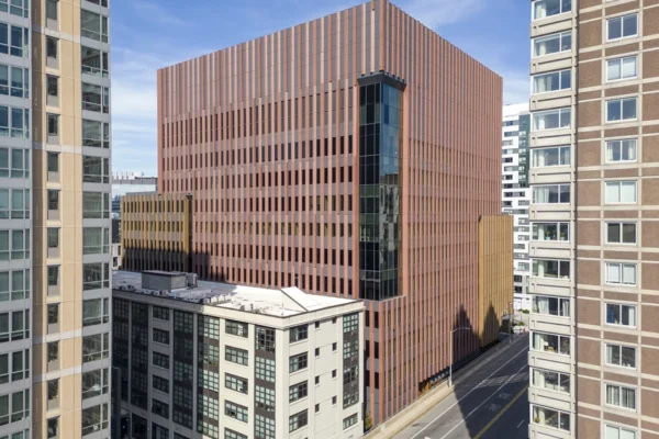 ParcelU_ExteriorWalls_CustomRust5 Weathered rust metal panels with rich texture and warm rust finish on façade.