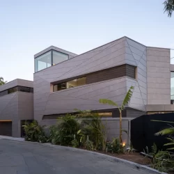High end residence featuring a silver metal finish on the exterior walls.